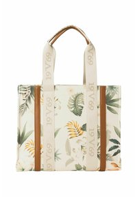 Blumige Tragetasche aus cremefarbenem Stoff mit grünen Blättern und orangefarbenen Akzenten. Verfügt über zwei seitliche Streifen aus braunem Leder und gewebten Trägern.