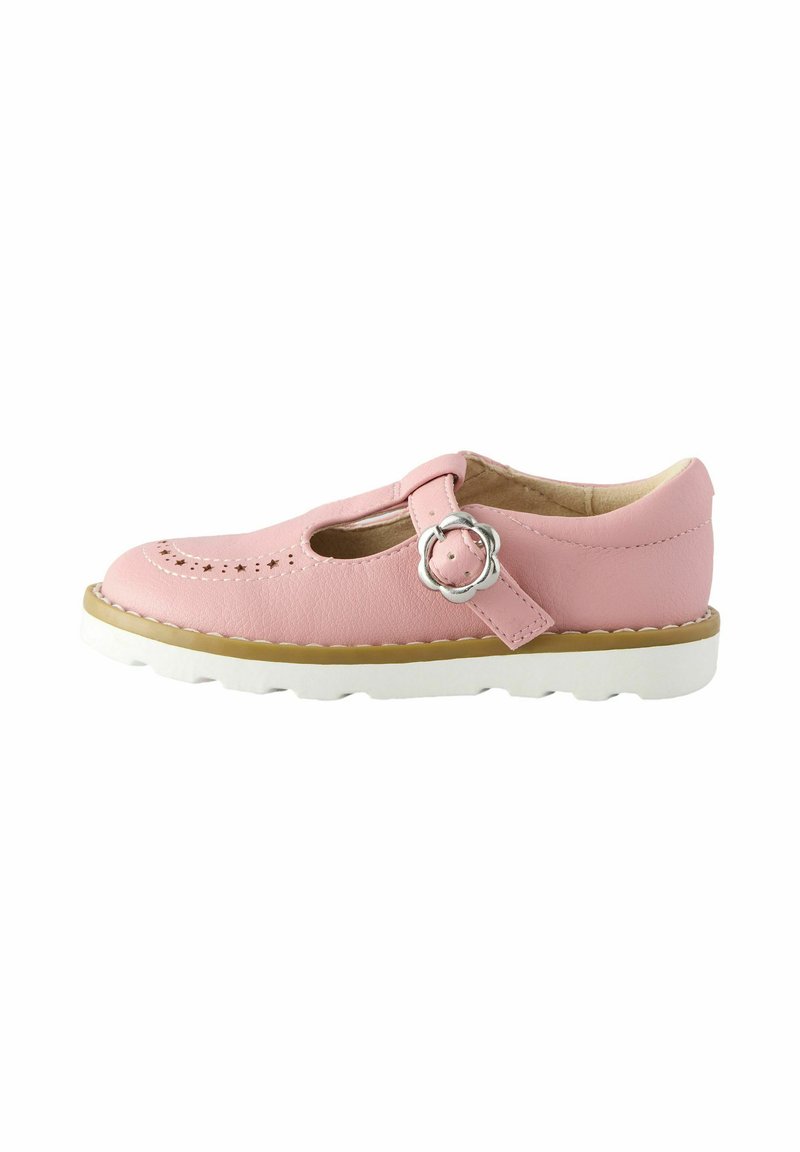 Rosa Leder-T-Bar-Schuh mit ausgeschnittenen Details und einer blumenförmigen Metallschnalle. Weiße Gummisohle mit strukturiertem Grip. Klassisches Design für Kinder.