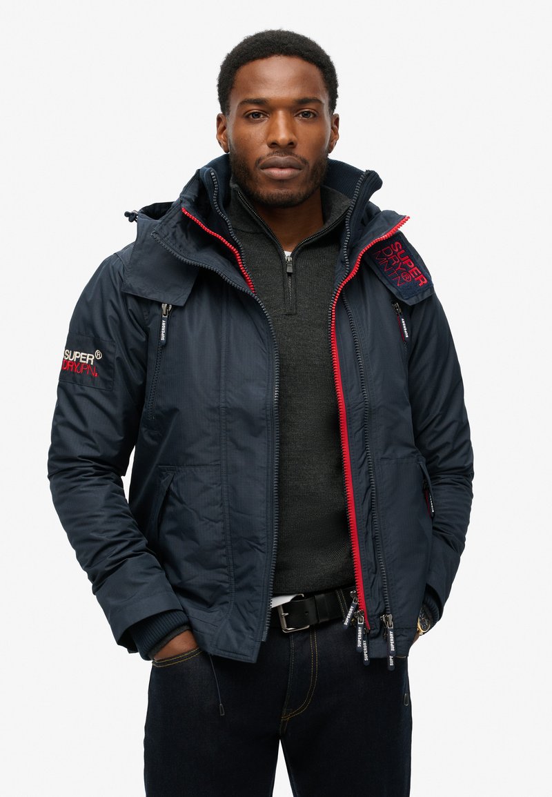 Veste Superdry Safari Wax - Taille XS, Vert - Occasion Très Bon état - Style Casual Avec Fermeture Zip