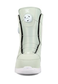 Buty snowboardowe DC, jasnozielony materiał syntetyczny, opływowy design, biały system sznurowania BOA, wyściełany kołnierz, teksturowane wnętrze.