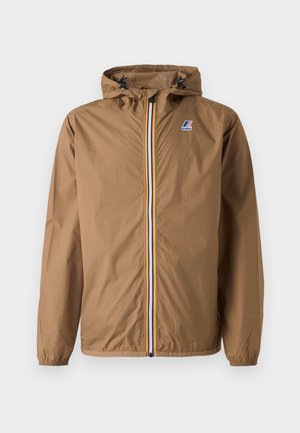 Brown lightweight jacket with a hood, featuring a front zipper with multi-colored stripes and elastic cuffs. Logo patch on the chest.