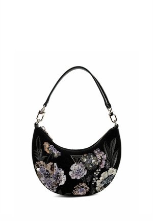Black crescent-shaped handbag with floral sequin designs and a short handle, featuring a small metal Guess logo plate.