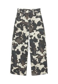 Jeans a gamba larga con motivo a stampa bianco e nero di mucca, bottoni frontali, cerniera e design a cinque tasche.