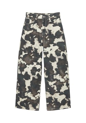 Jeans a gamba larga con motivo a stampa bianco e nero di mucca, bottoni frontali, cerniera e design a cinque tasche.