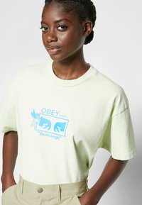 Obey Clothing BRIGHTON CARPENTER - Παντελόνι - cucumber