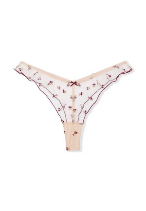 Lace thong in soft peach with maroon floral embroidery. Features a delicate ruffled edge and a small bow accent at the front.