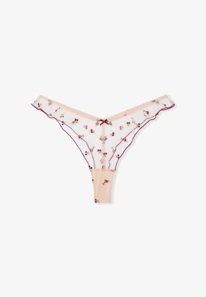 Lace thong in soft peach with maroon floral embroidery. Features a delicate ruffled edge and a small bow accent at the front.