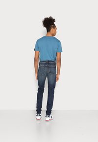 Diesel SLEENKER - Calças de ganga de corte skinny - 069yy 01