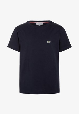 Mörkblå T-shirt med korta ärmar, rund hals och en liten grön krokodillogotyp på vänster bröst.