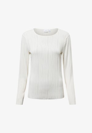 Top de manga larga en suave tejido color crema claro con un patrón de olas texturizado y un escote redondo amplio. Diseño liso y ajustado en toda la prenda.