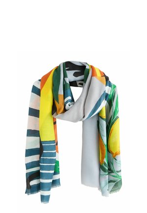 Scarf with colorful abstract patterns including stripes, green leaves, lemons, and bold shapes in yellow, orange, blue, and black tones.