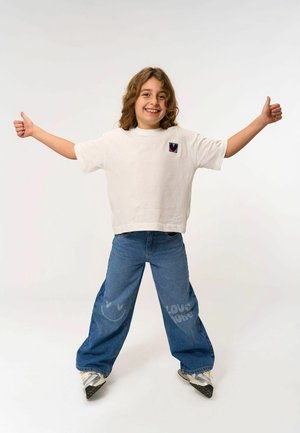 The New PURITY WIDE - Flared Jeans - medium blue denim