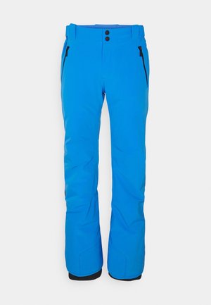 Helles blaue, isolierte Skihose mit schwarzen seitlichen Reißverschlusstaschen, zwei vorderen Knöpfen und verstärkten Bündchen an den Knöcheln.