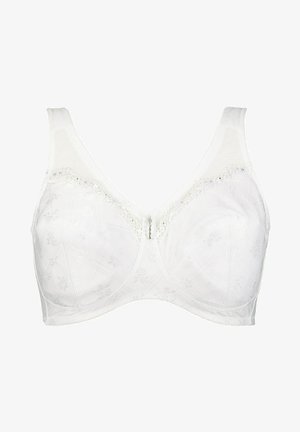 Reggiseno bianco con dettagli in pizzo, pannelli in rete trasparente e un distanziatore decorativo al centro. Presenta un motivo floreale testurizzato e spalline larghe.