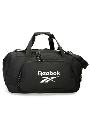 Bolsa de deporte Reebok negra con doble asa, correa ajustable para el hombro, compartimentos con cremallera y logo blanco en el bolsillo frontal.