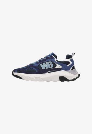 Navy blue and white sneaker with mesh and suede panels, thick white sole, "W6" logo on side, and pull tab on heel.