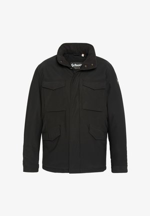 Chaqueta negra de longitud media con un cuello suave, cuatro bolsillos frontales y cierre de cremallera, que presenta una tela suave y texturizada.