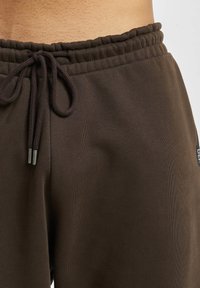 DEF Tréningruha alsók - brown
