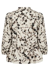 Peplum top in textured fabric featuring a cream background with black and brown splatter pattern. High neckline and gathered shoulders.