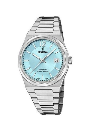 Orologio in acciaio inox argentato con quadrante azzurro chiaro, funzione data, vetro zaffiro e lunetta texturizzata, con indici e lancette delle ore.
