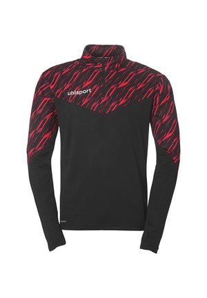 Haut de sport à manches longues noir avec col zippé mi-haut. Présente un motif abstrait rouge sur le haut du corps et le logo "uhlsport" en blanc.