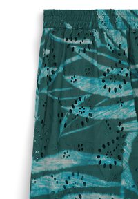 Türkisfarbener Stoff mit gemusterten Ausschnitten in Blumenform und einem Batik-Effekt. Elastischer Bund mit subtiler Textur und geschichteten Elementen.