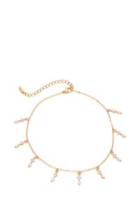 Guldkædebånd med små, vedhængslignende accenter og diaman-lignende detaljer. Justerbar lås og kædelængde for tilpasset pasform.