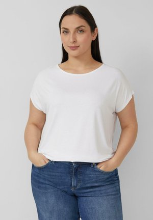 White short-sleeve t-shirt made of soft fabric, featuring a round neckline and relaxed fit, paired with blue denim jeans.