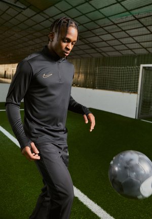 Nike Performance DRIL TOP - Camiseta de manga larga - black/metallic gold