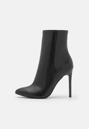 Stivaletti con tacco - black