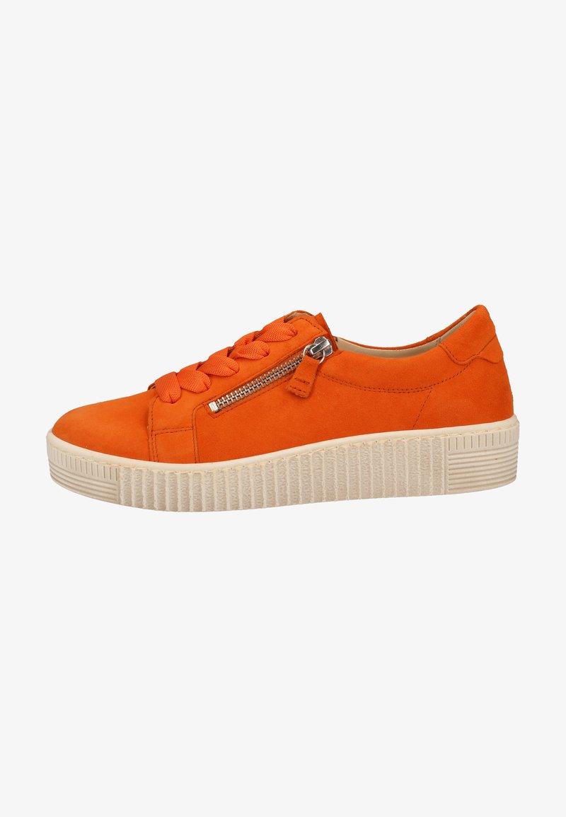 Orange suede sneaker with braided lace detail and a side zipper. Thick white rubber sole with textured grip. Smooth interior lining.