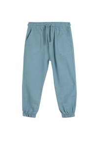 Hellblaue, locker geschnittene Hose mit elastischem Bund, Kordelzug und zwei vorderen Taschen. Die Bündchen sind ebenfalls elastisch.