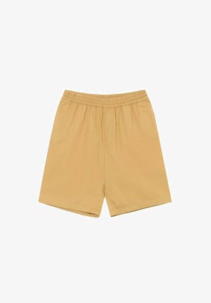 Pantalones cortos beige con cintura elástica y una textura suave, que presentan una fila de botones en la parte delantera y un corte relajado. Diseño simple sin patrones.