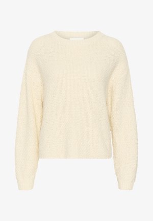Kremno barvan pleteni pulover s okroglim izrezom, spuščena ramena in rebrastimi manšetami. Opremljen z teksturiranim vzorcem šiva.