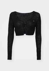 Cárdigan negro corto hecho de un punto ligero, con mangas largas, escote en V profundo y dos botones delanteros. Acabado texturizado con ligera transparencia.