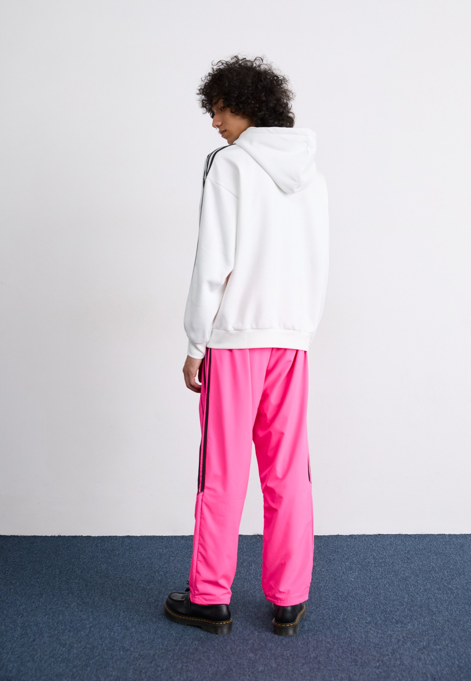 adidas Originals TEAMGEIST - Tracksuit bottoms - lucid pink/black