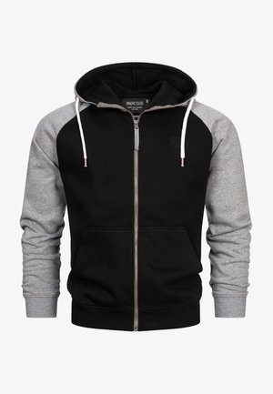 Sort og grå lynlås hoodie med hætte, der har en kengurulomme og kontrastærmer. Fremstillet af blødt stof med ribbede manchetter.