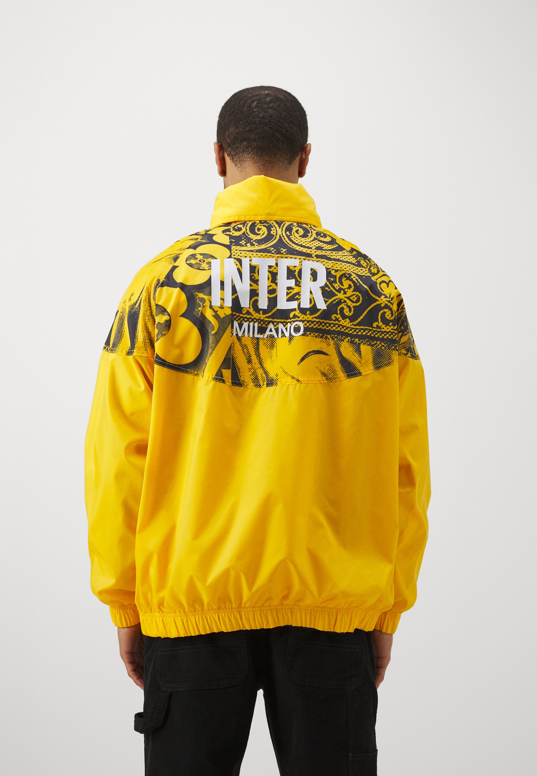 university gold jacket