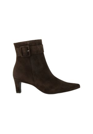 Dark brown suede ankle boot with low heel, pointed toe, and decorative wide strap with square buckle around the ankle.