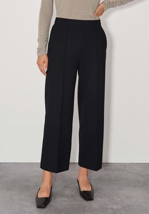 Spodnie materiałowe