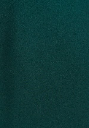 Tealgrøn stof med en blød, glat tekstur og en subtil glans, der viser en ensartet overflade uden mønstre eller accenter.