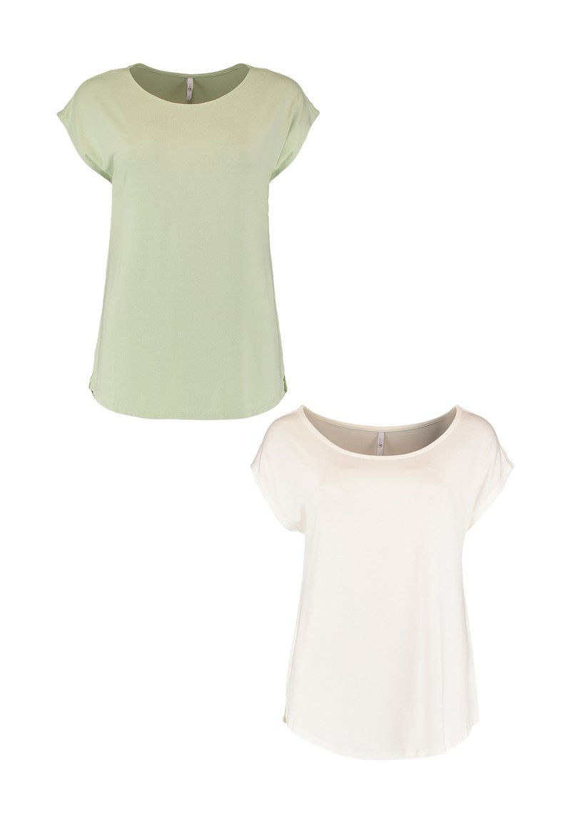 Two short-sleeve tops: one light green and one white. Both have a rounded neckline, soft texture, and curved hemline.