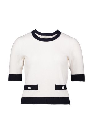 Korte mouw witte trui met zwarte accenten op de kraag en zakken. Textuurstof, met twee decoratieve knopen op de voorzakken.
