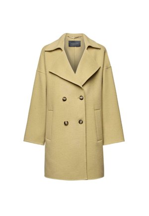 Doppelreiher-Mantel aus weichem, hellgelbem Wollstoff mit breitem Kragen, zwei frontalen Taschen und braunen Knöpfen in einem klaren, minimalistischen Design.