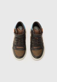 Brown high-top sneakers with a leather and mesh upper, featuring blue accents, orange hardware, and a textured finish. Lace and Velcro closure.