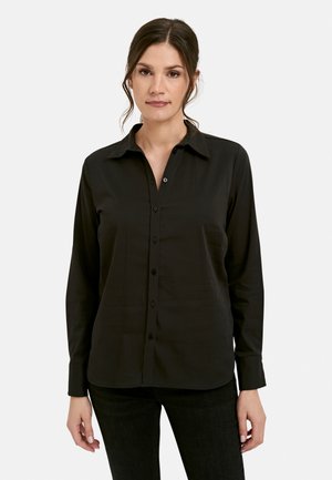 Schwarzes Langarmshirt aus glattem Stoff, mit Knopfleiste, klassischem Kragen und taillierten Manschetten. Einfaches Design ohne Muster.