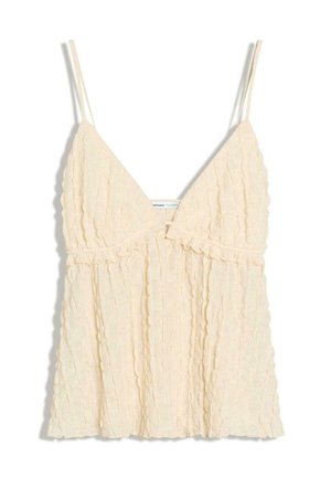 Top camisola crem fără mâneci din dantelă, cu bretele subțiri și decolteu în V, cu un model vertical texturat.