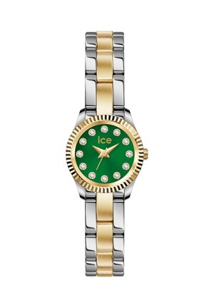 Dvojbarevné stříbrné a zlaté náramkové hodinky se zeleným ciferníkem, zlatými ručičkami, krystalovými hodinovými značkami a logem „ice“ na pozici 12 hodin.