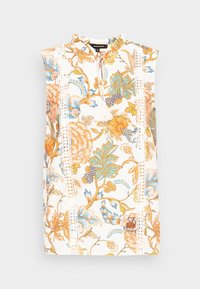 Haut sans manches avec un imprimé floral orange et bleu sur fond blanc. Comprend des accents en dentelle et un détail de pompon au niveau de l'encolure.