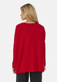 Masai Strickpullover - haute red